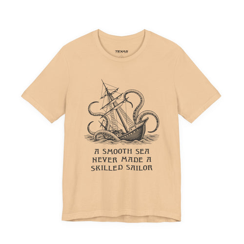 A smooth sea never made a skilled sailor — Unisex Cotton Tee